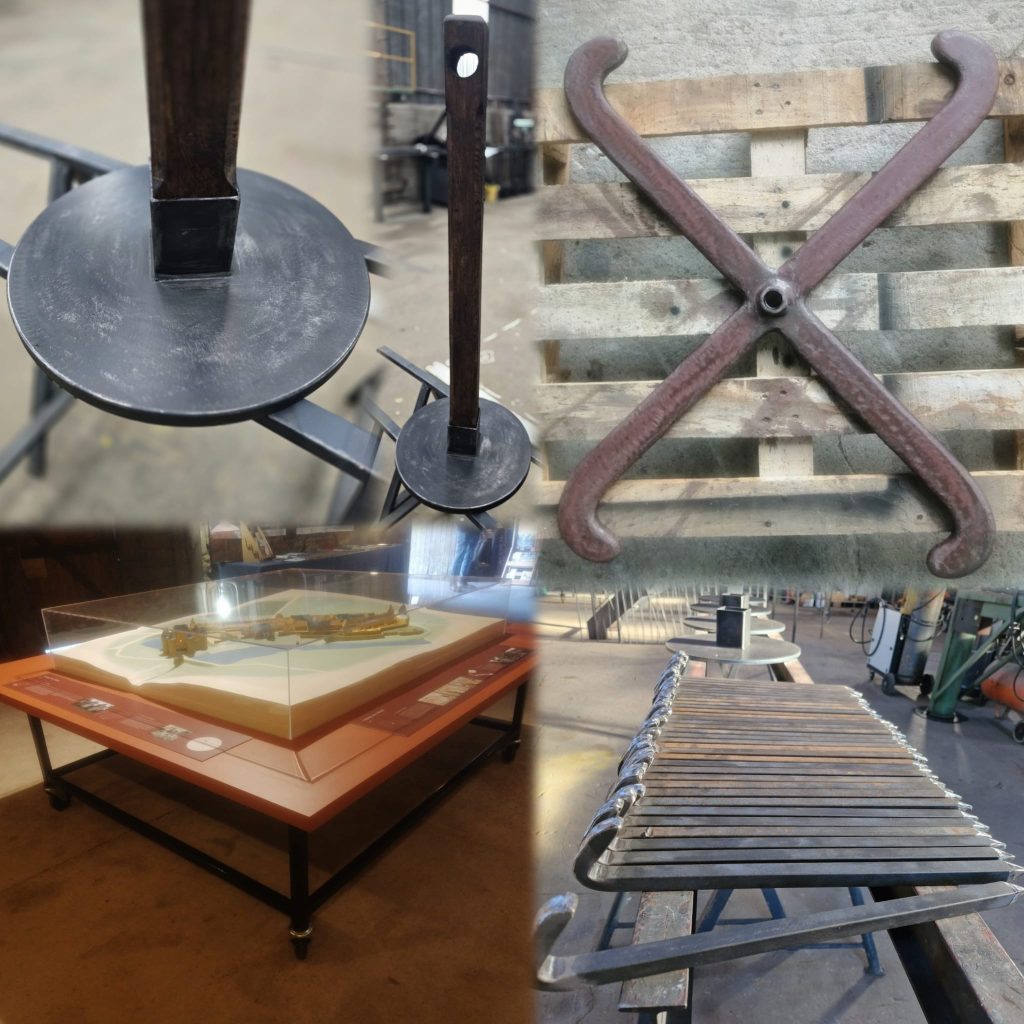 Fabrications métalliques sur mesure pour château : pieds de poteaux en acier lourd, clés de tirant, sardines XXL et support à roulettes pour maquette.